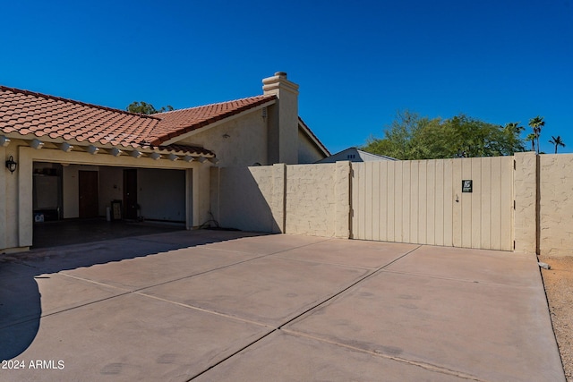 view of side of property with a garage