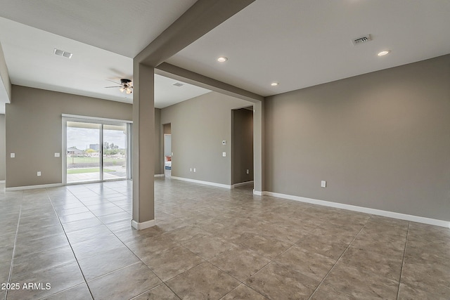 spare room featuring baseboards, a ceiling fan, visible vents, and recessed lighting