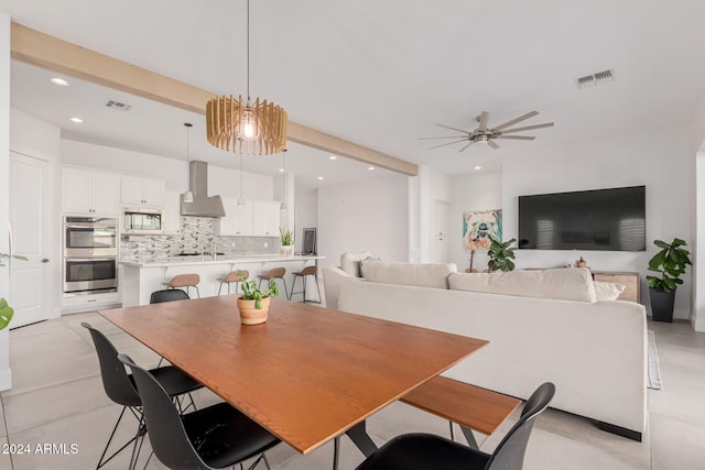 dining area with ceiling fan