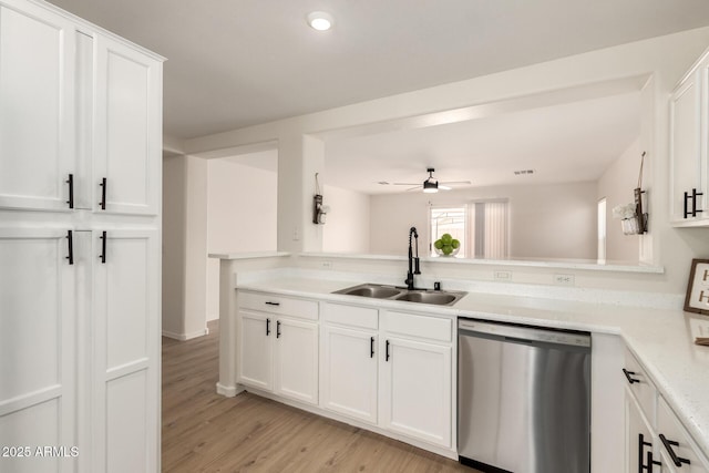 22547 W Pima St, Buckeye, AZ 85326 - kitchen with stainless steel dishwasher, a ceiling fan, white cabinetry, light wood-type flooring, and recessed lighting