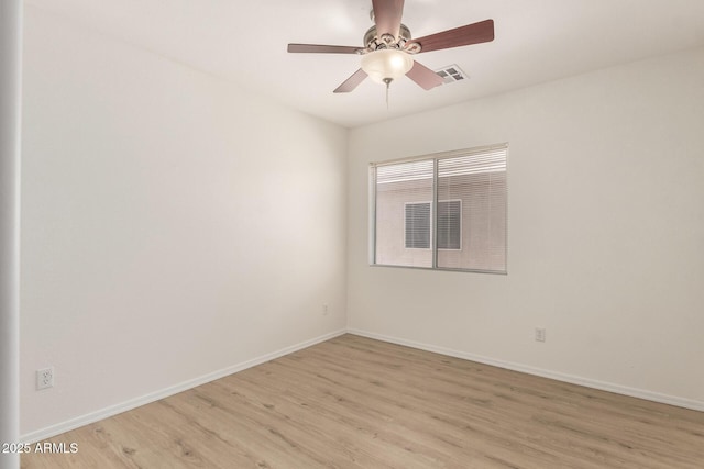 22547 W Pima St, Buckeye, AZ 85326 - unfurnished room with light wood-type flooring and a ceiling fan