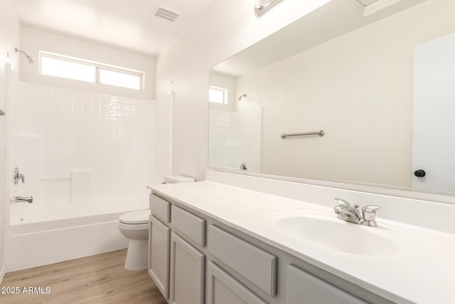 22547 W Pima St, Buckeye, AZ 85326 - full bath with vanity, shower / bathtub combination, and wood finished floors