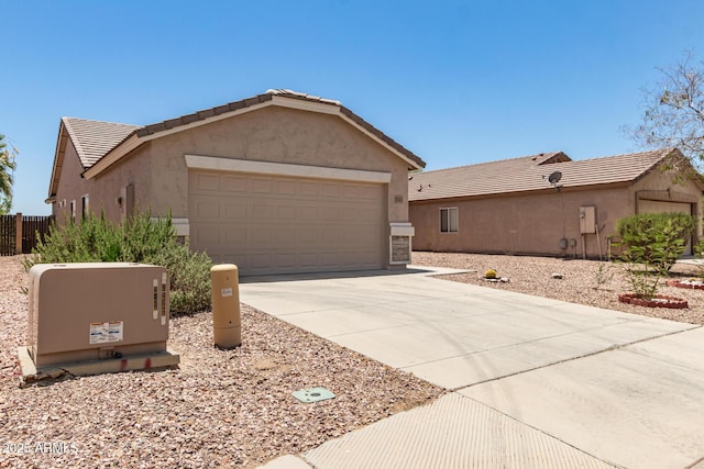 22547 W Pima St, Buckeye, AZ 85326 - ranch-style home featuring concrete driveway, a garage, stucco siding, and a tiled roof
