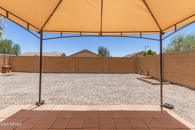 22547 W Pima St, Buckeye, AZ 85326 - fenced backyard featuring a gazebo and a patio