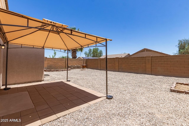 22547 W Pima St, Buckeye, AZ 85326 - fenced backyard featuring a gazebo and a patio area