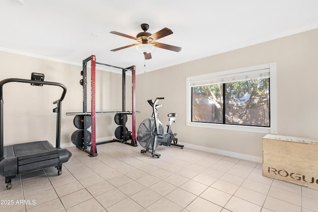 workout room featuring crown molding, light tile patterned floors, and ceiling fan