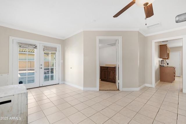 unfurnished living room featuring crown molding, light tile patterned flooring, ceiling fan, and french doors