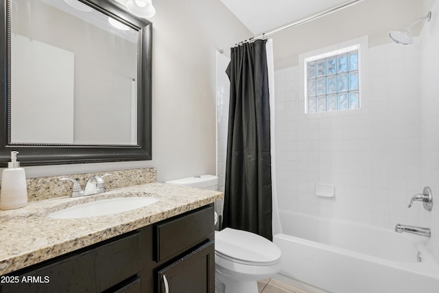 full bathroom with vanity, toilet, and shower / tub combo