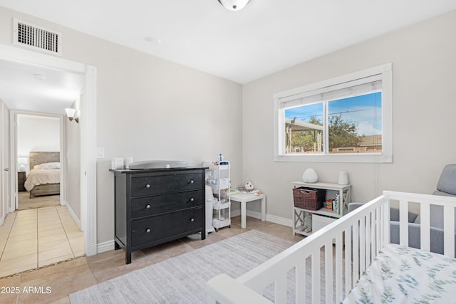 bedroom with tile patterned flooring