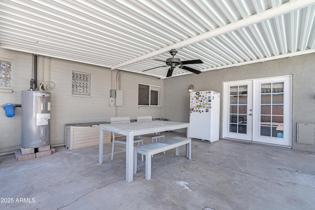 view of patio featuring electric panel, water heater, ceiling fan, and french doors