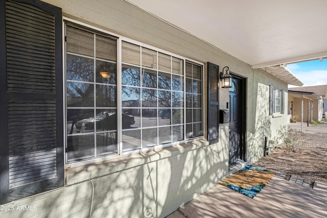 doorway to property with a porch