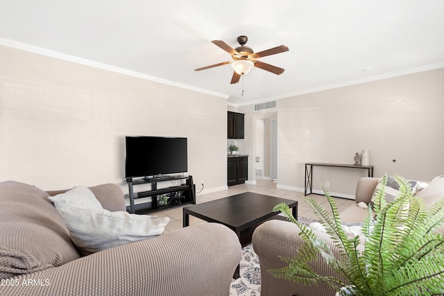 living room featuring ceiling fan, light tile patterned floors, and ornamental molding