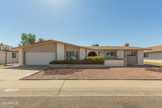 single story home with a garage