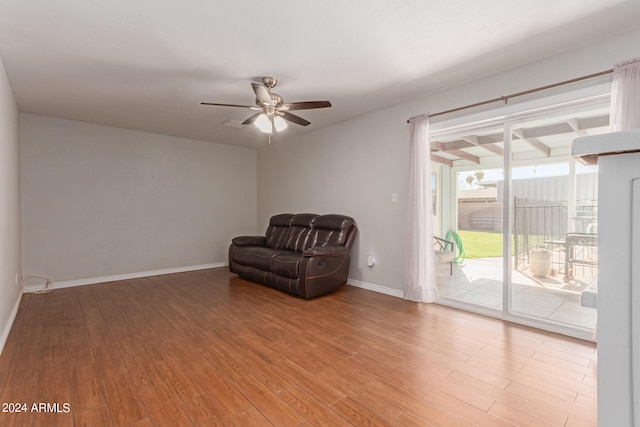 unfurnished room with ceiling fan and hardwood / wood-style flooring