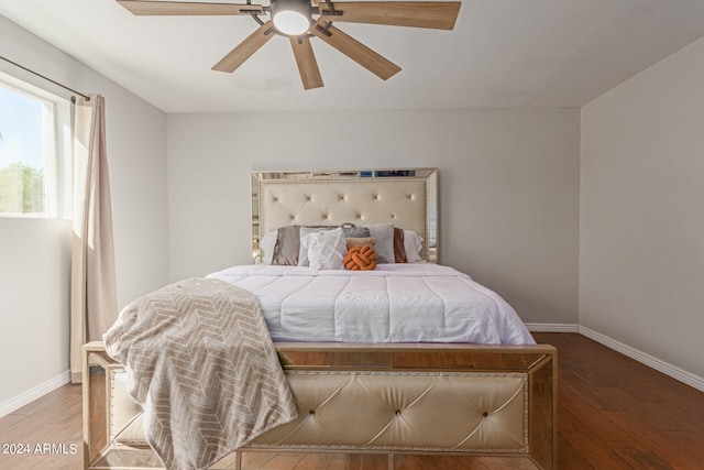 bedroom featuring wood-type flooring and ceiling fan