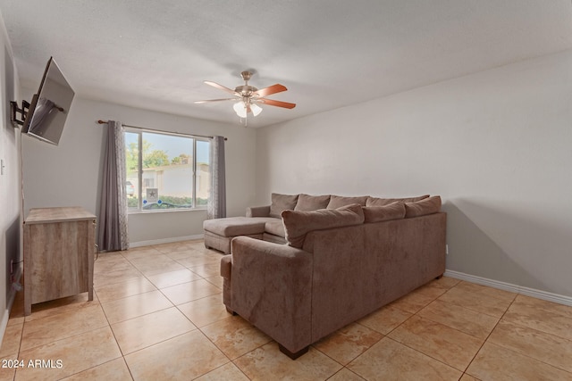 living room with light tile patterned flooring and ceiling fan