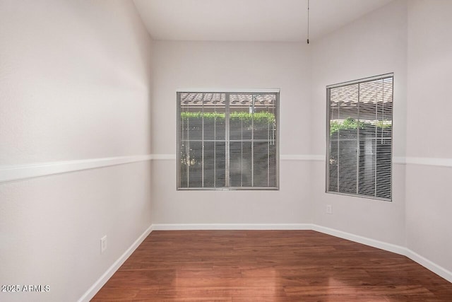 40713 N Courage Trl, Anthem, AZ 85086 - spare room featuring wood finished floors and baseboards