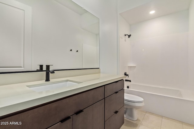 full bathroom featuring toilet, vanity,  shower combination, and tile patterned floors