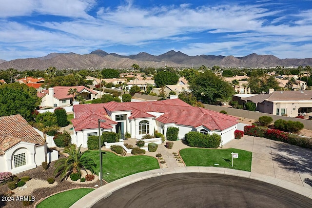 drone / aerial view featuring a mountain view