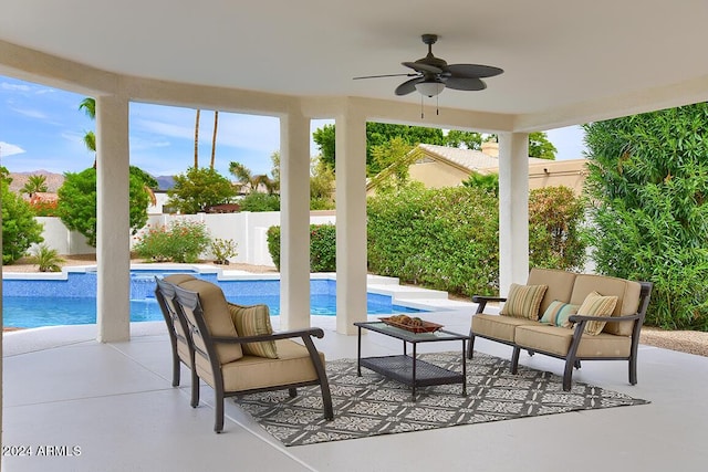 exterior space featuring outdoor lounge area, ceiling fan, and a patio area