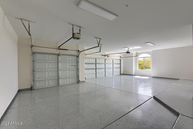 garage featuring a garage door opener