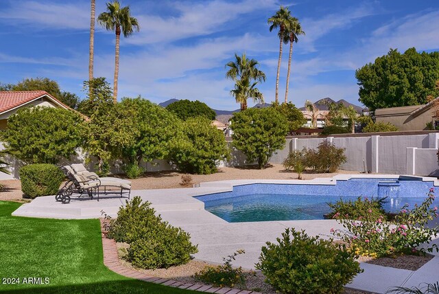 view of pool featuring a patio