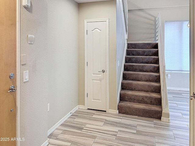 stairway with baseboards