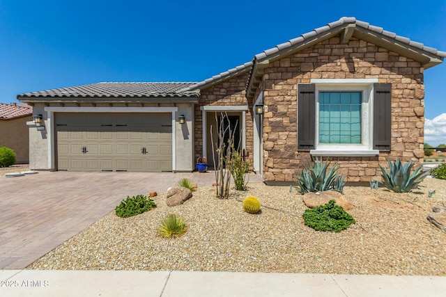 view of front of home with a garage