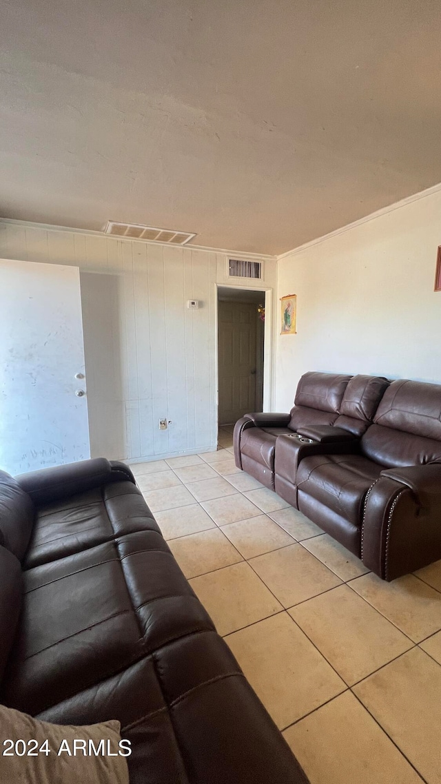 living room featuring light tile flooring