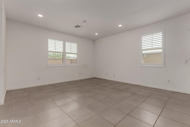 22568 E Rosa Rd, Queen Creek, AZ 85142 - empty room featuring recessed lighting, light tile patterned flooring, and baseboards