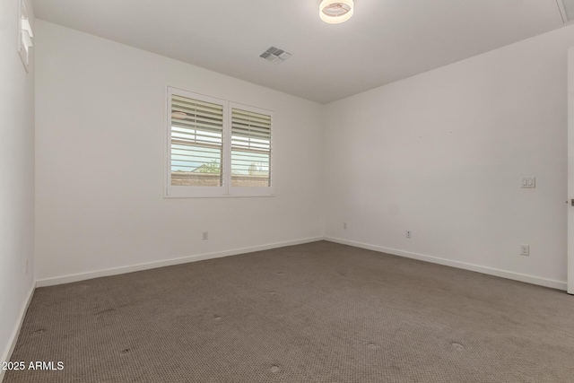 22568 E Rosa Rd, Queen Creek, AZ 85142 - spare room with dark colored carpet and baseboards