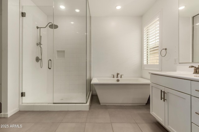 22568 E Rosa Rd, Queen Creek, AZ 85142 - full bathroom featuring a stall shower, vanity, a freestanding tub, tile patterned floors, and recessed lighting