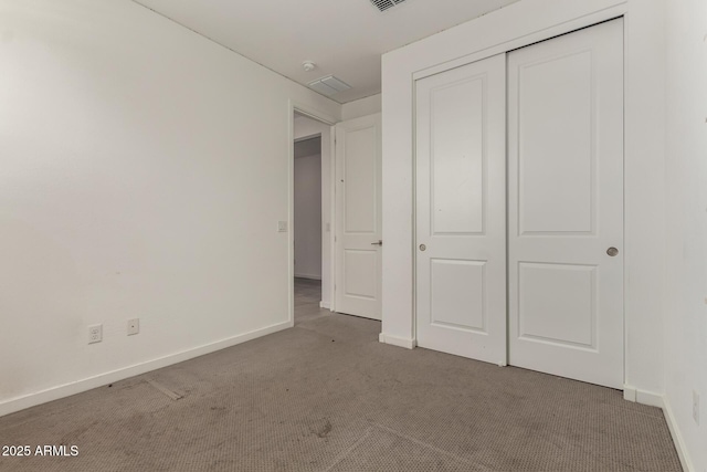 22568 E Rosa Rd, Queen Creek, AZ 85142 - unfurnished bedroom with carpet floors, baseboards, and a closet