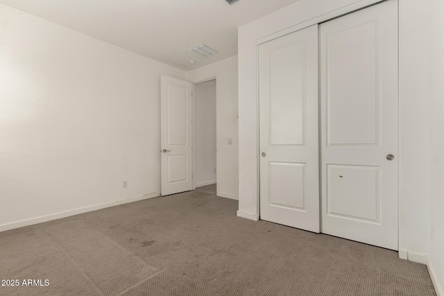 22568 E Rosa Rd, Queen Creek, AZ 85142 - unfurnished bedroom featuring carpet floors, baseboards, and a closet