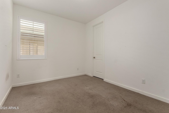 22568 E Rosa Rd, Queen Creek, AZ 85142 - carpeted empty room featuring baseboards