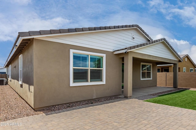 22568 E Rosa Rd, Queen Creek, AZ 85142 - view of front of property with a patio area, cooling unit, and stucco siding