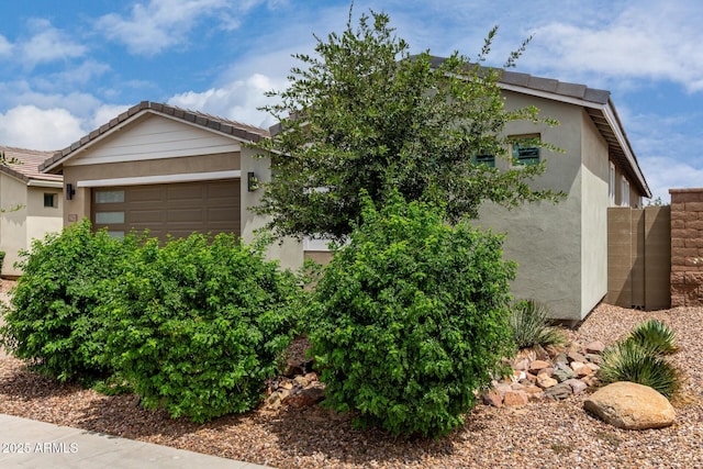 22568 E Rosa Rd, Queen Creek, AZ 85142 - view of front of house featuring stucco siding and an attached garage