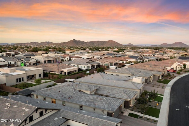 aerial view at dusk with a mountain view