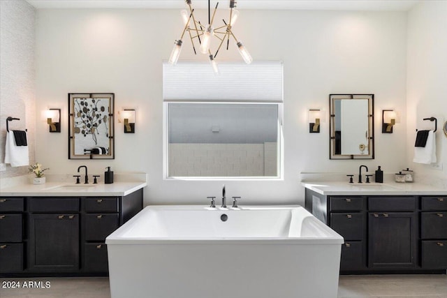 bathroom featuring vanity and a washtub