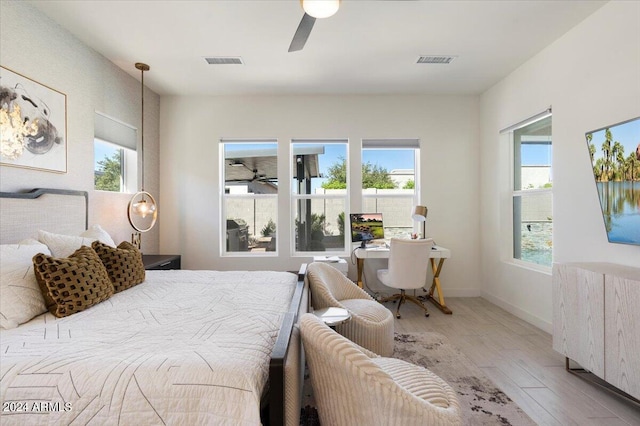 bedroom featuring ceiling fan and light hardwood / wood-style flooring