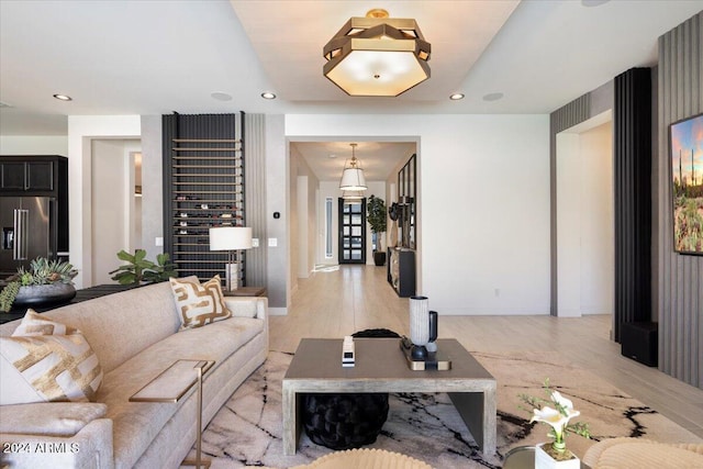 living room with light hardwood / wood-style floors