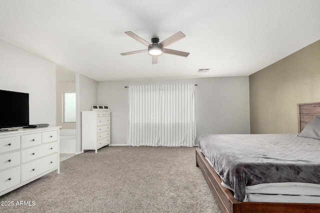 bedroom with a ceiling fan, light carpet, and visible vents