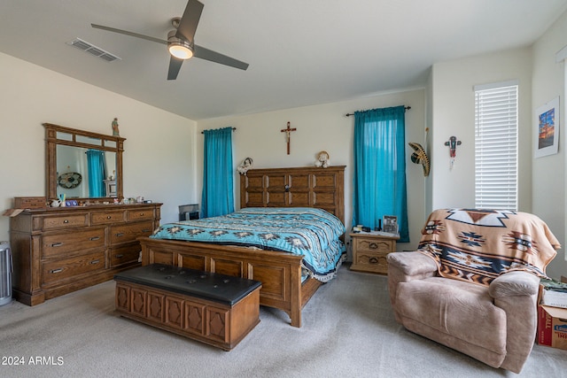 carpeted bedroom with ceiling fan