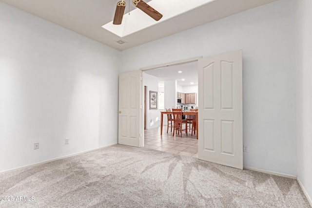 empty room with recessed lighting, visible vents, a ceiling fan, carpet flooring, and baseboards