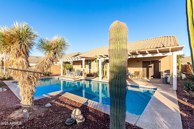 view of swimming pool with a fenced in pool, fence, a pergola, and a patio