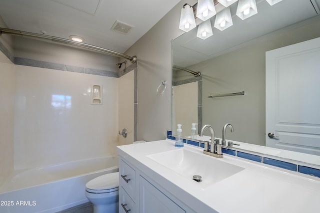 full bathroom with vanity, toilet, and shower / tub combination