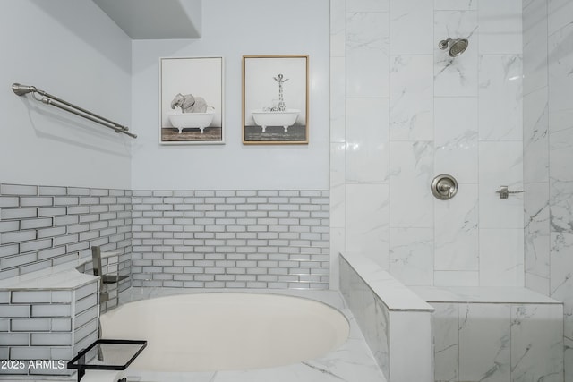 bathroom featuring a washtub