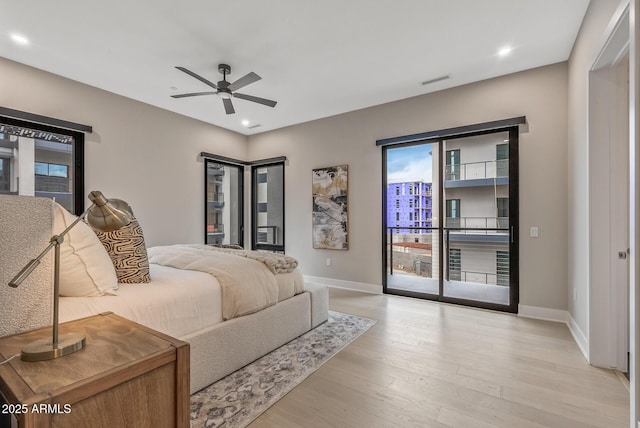 bedroom featuring visible vents, a ceiling fan, light wood finished floors, baseboards, and access to exterior