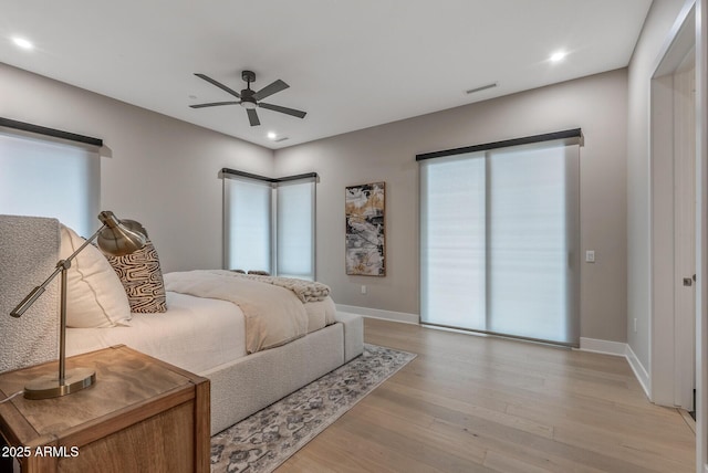 bedroom featuring recessed lighting, baseboards, a ceiling fan, and light wood finished floors