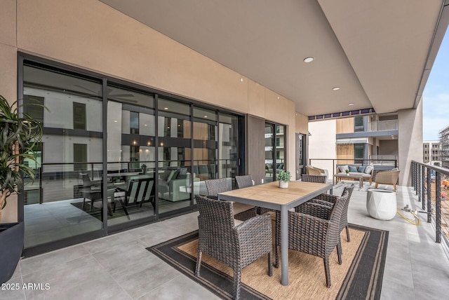 view of patio with outdoor dining space and an outdoor hangout area